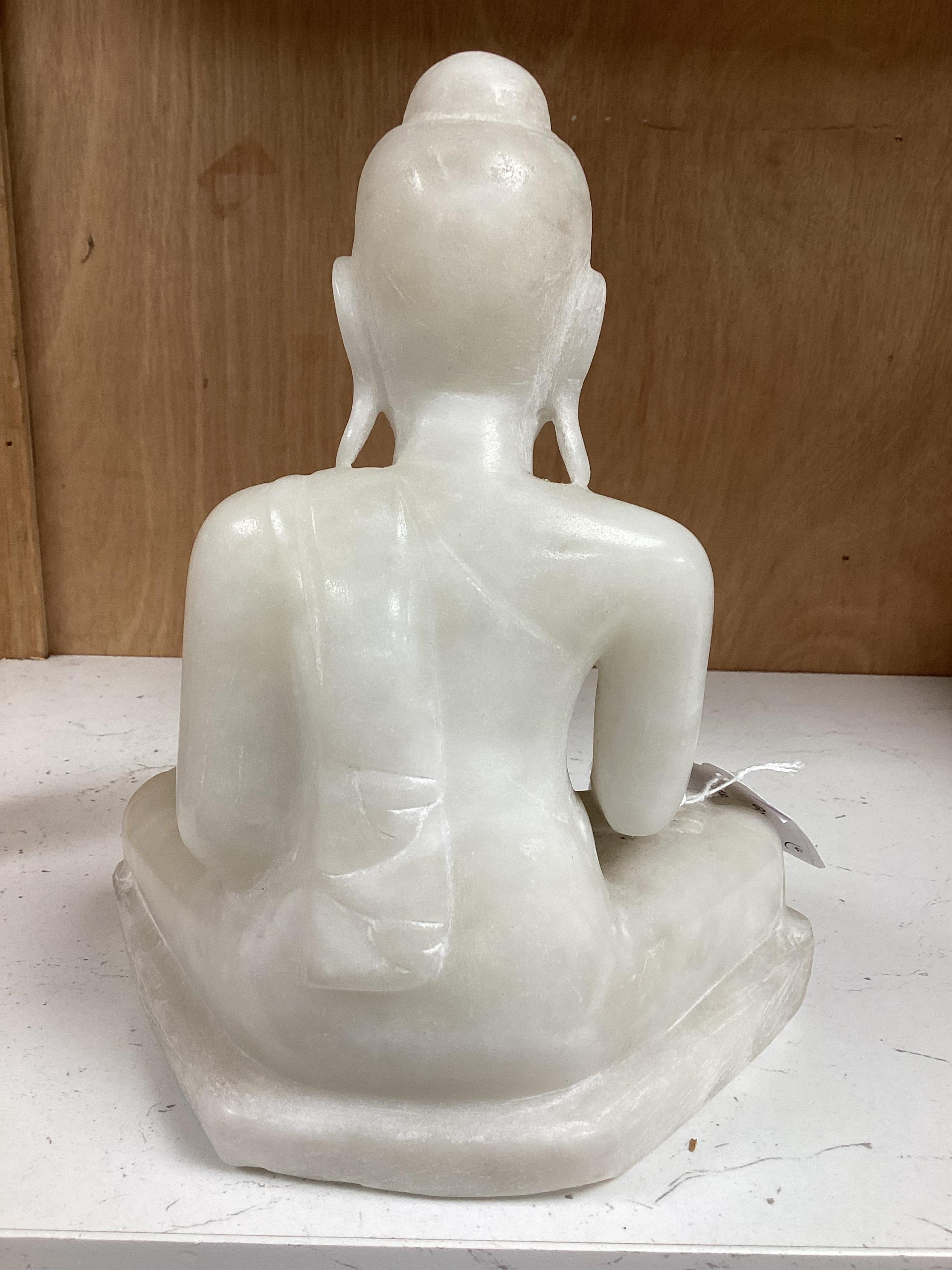 Two modern jade figures, together with a marble Buddha and a carved giltwood figure, largest 24cm wide